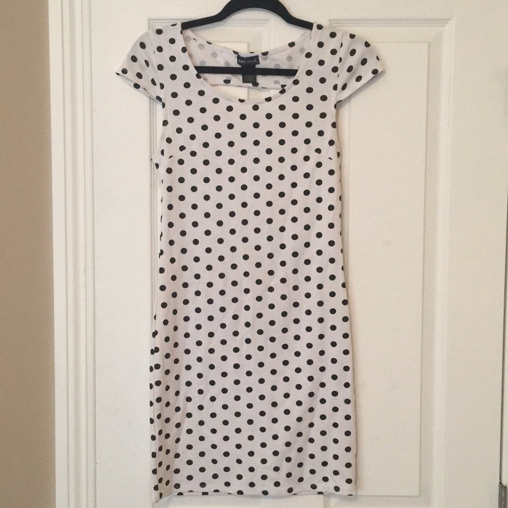 White mini dress with black polka dots